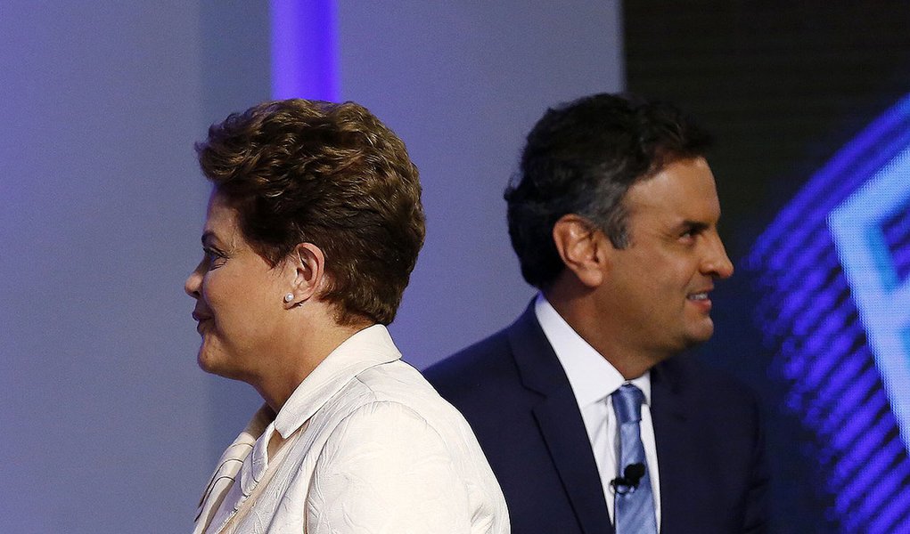 Os candidatos Ã  PresidÃªncia Dilma Rousseff (PT) e AÃ©cio Neves (PSDB) durante debate na quinta-feira.  REUTERS/Ricardo Moraes