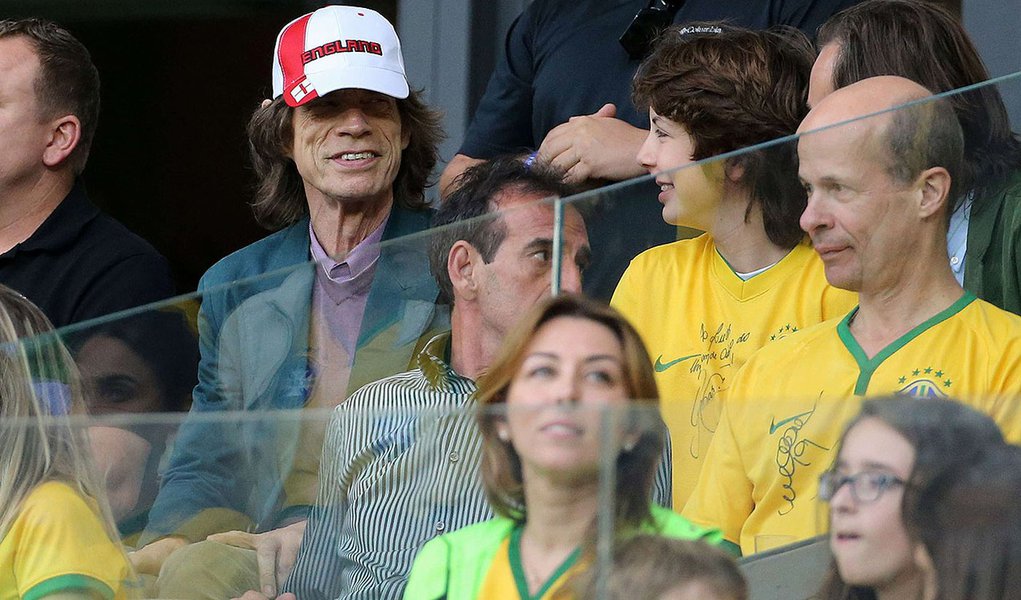 BELO HORIZONTE, BRAZIL - JULY 8:  Mick Jagger and his son Lucas attend the 2014 FIFA World Cup Brazil Semi Final match between Brazil and Germany at Estadio Mineirao on July 8, 2014 in Belo Horizonte, Brazil. (Photo by Jean Catuffe/Getty Images) *** Local