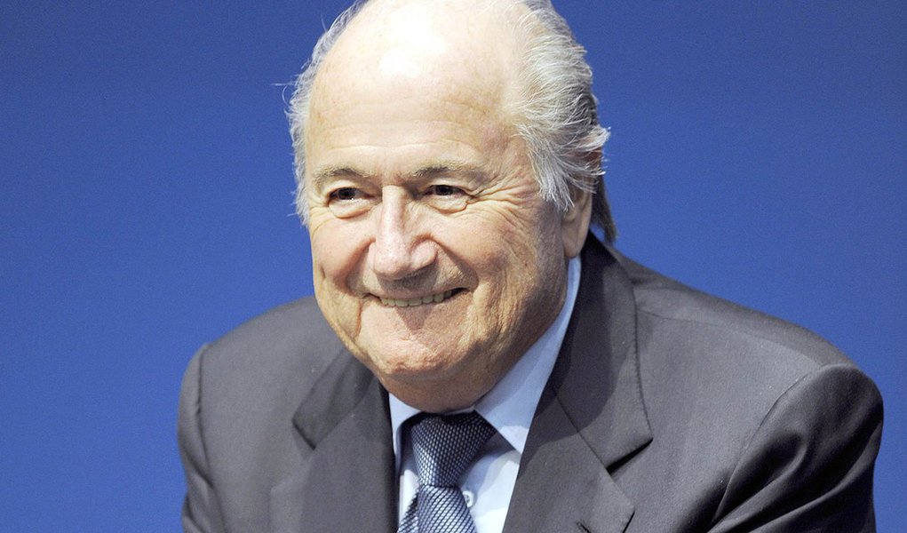 FIFA President Joseph S. Blatter smiles during a press conference in Zurich, Switzerland, Thursday, March 3, 2011. FIFA is giving its six continents the same number of qualifying places for the 2014 World Cup as in 2010, but will conduct a draw for the pl