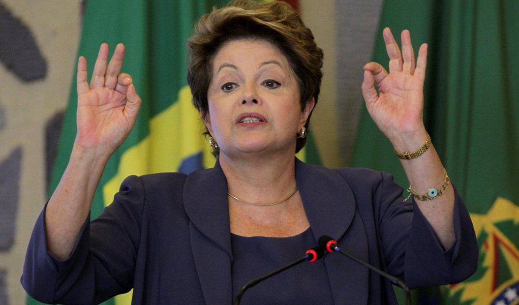 Brazil's President Dilma Rousseff reacts during the plenary meeting for the Council of Economic and Social Development at Itamaraty Palace in Brasilia July 17, 2013. REUTERS/Ueslei Marcelino (BRAZIL - Tags: POLITICS)