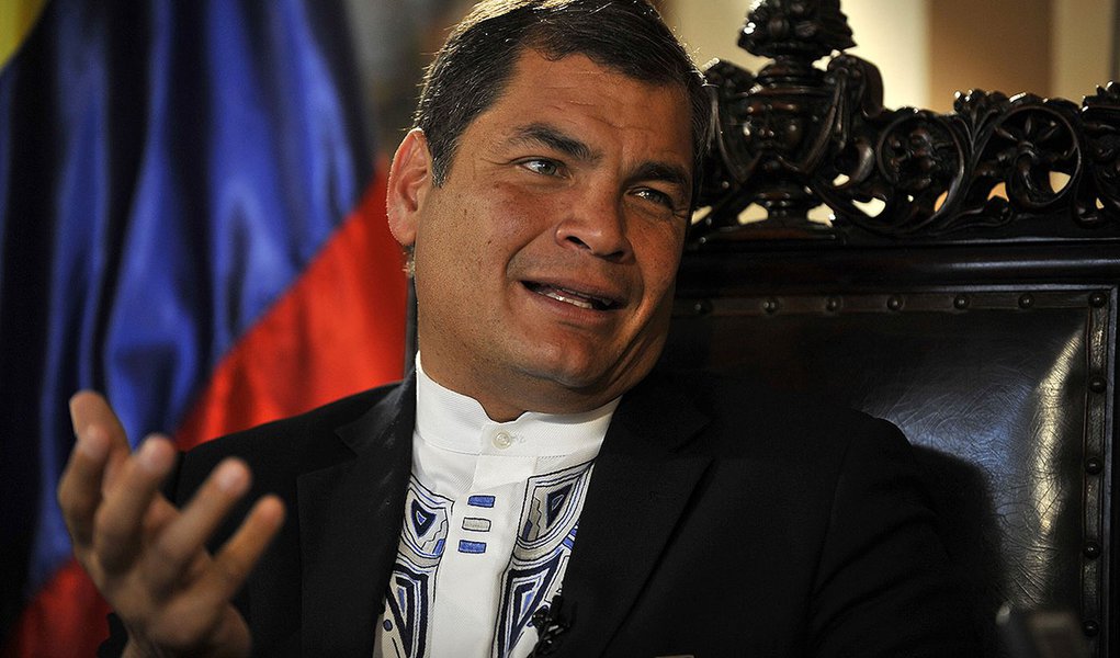 Ecuadorean President Rafael Correa speaks during an interview with AFP  in the frame of the 42nd OAS General Assembly in Tiquipaya, central Bolivia, on June 4, 2012. AFP PHOTO/Aizar Raldes        (Photo credit should read AIZAR RALDES/AFP/GettyImages)