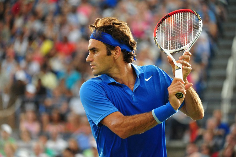 Roger Federer during his fourth round encounter against Tommy Robredo on Louis Armstrong Stadium. 