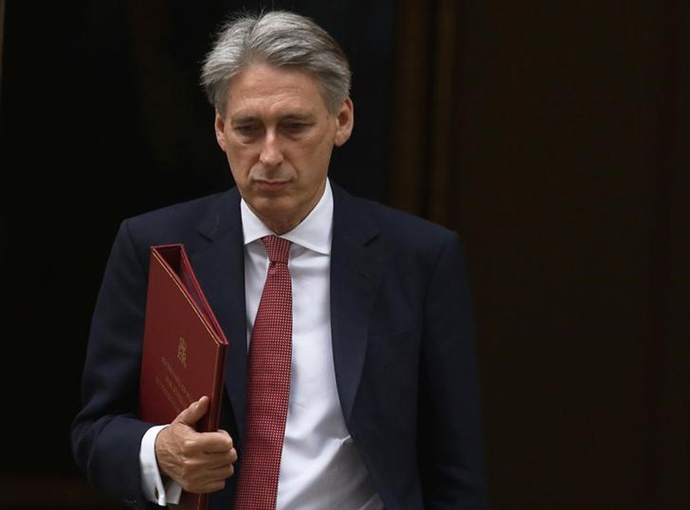 SecretÃ¡rio do Exterior britÃ¢nico, Philip Hammond, deixa Downing Street, em Londres. 03/09/2014  REUTERS/Luke MacGregor