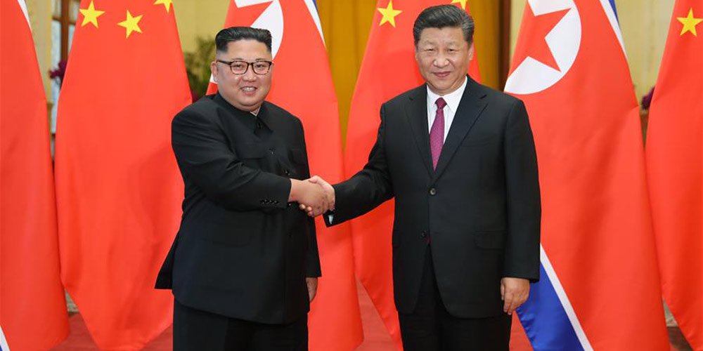 Em encontro histórico, Xi Jinping e Kim Jong Un conversam sobre paz e desenvolvimento