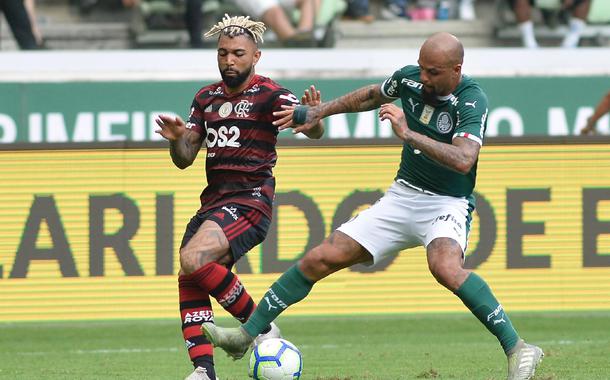 Gabigol (Flamengo) e Felipe Melo (Palmeiras)