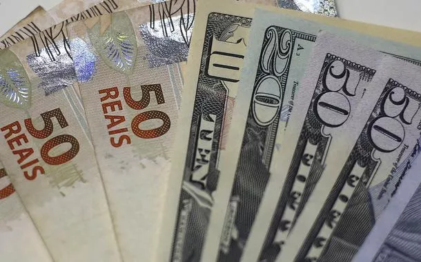 Pagamento antecipado de dividendos pode pressionar a cotação do real