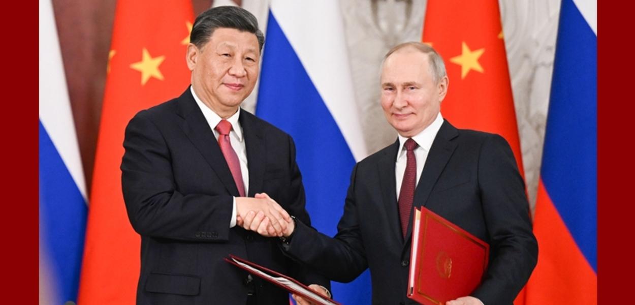 Presidentes Xi Jinping e Vladimir Putin (Xinhua/Xie Huanchi)