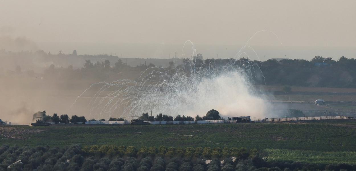 An explosion is pictured in the Gaza Strip, as seen from Israel, October 30, 2023. REUTERS/Amir Cohen