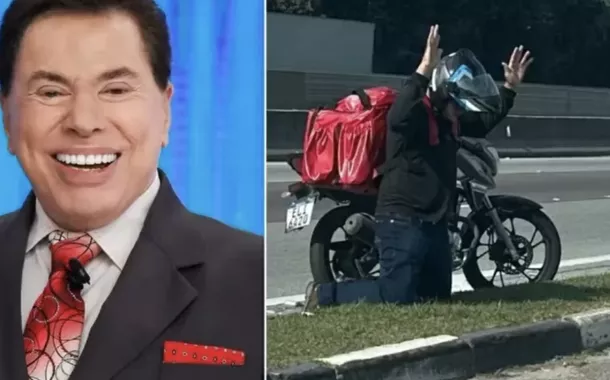 Motoboy reza em frente ao SBT após morte de Silvio Santos