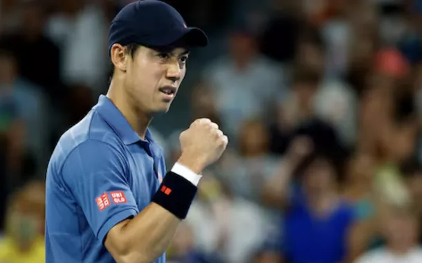 Tênis - Aberto da Austrália - Melbourne Park, Melbourne, Austrália - 12 de janeiro de 2025 - O japonês Kei Nishikori reage durante sua partida de primeira rodada contra o brasileiro Thiago Monteiro 