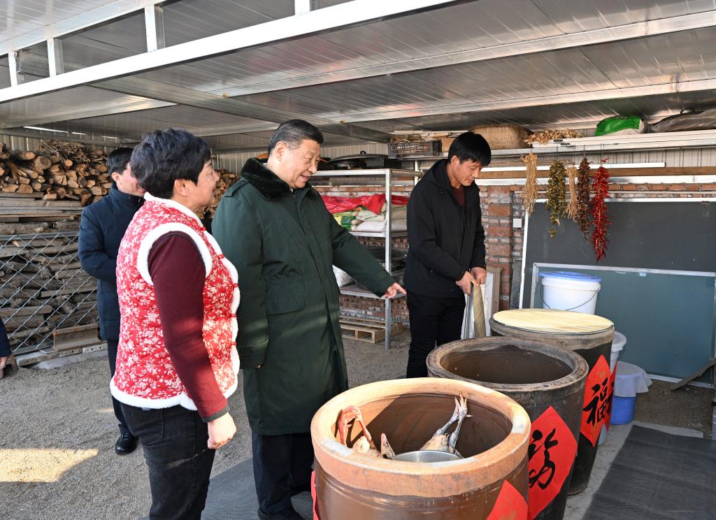 Xi visita moradores afetados pelas enchentes no nordeste da China