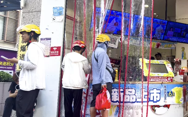 Entregadores de delivery na China