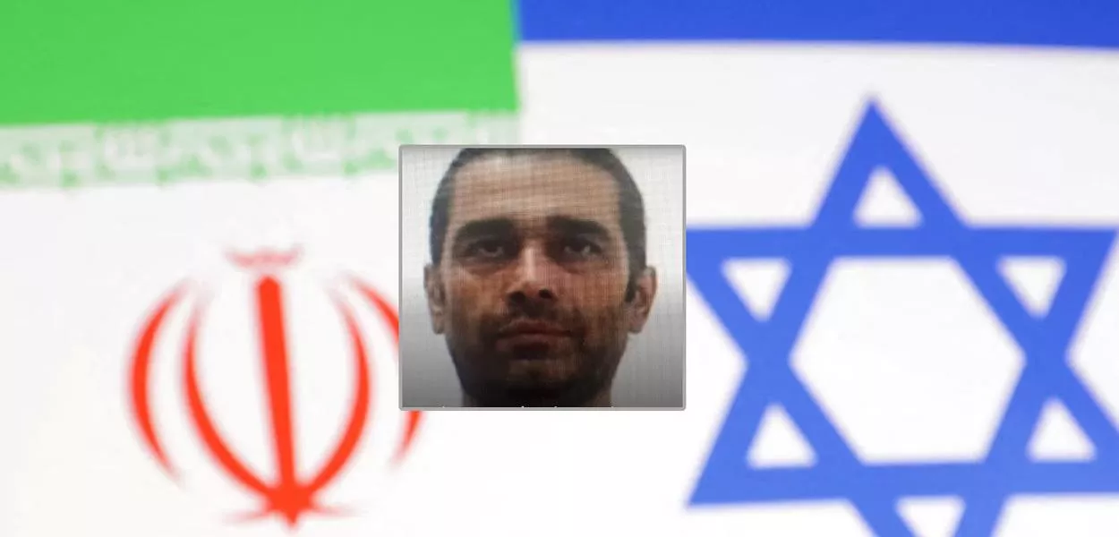 Bahram Choubi Asl e as bandeiras do Irã (à esq.) e de Israel ao fundo
