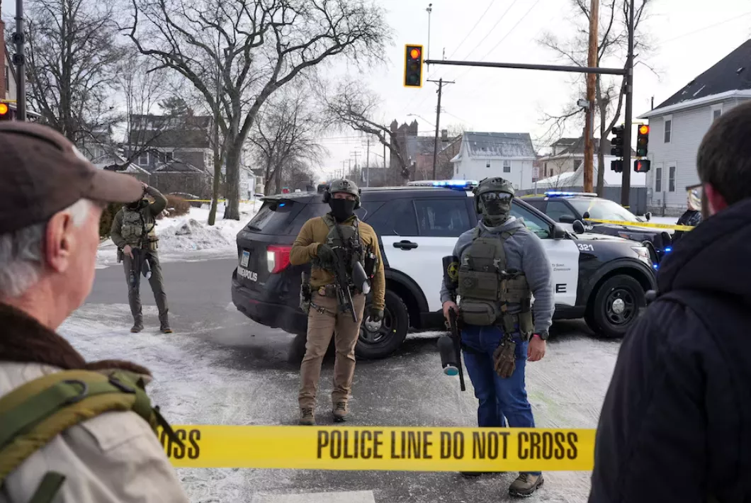 Members of U.S. Immigration and Customs Enforcement (ICE) stand at the scene after a driver of a vehicle was shot in Minneapolis, Minnesota, U.S., January 7, 2026.