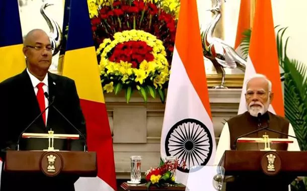 Patrick Herminie e Narendra Modi