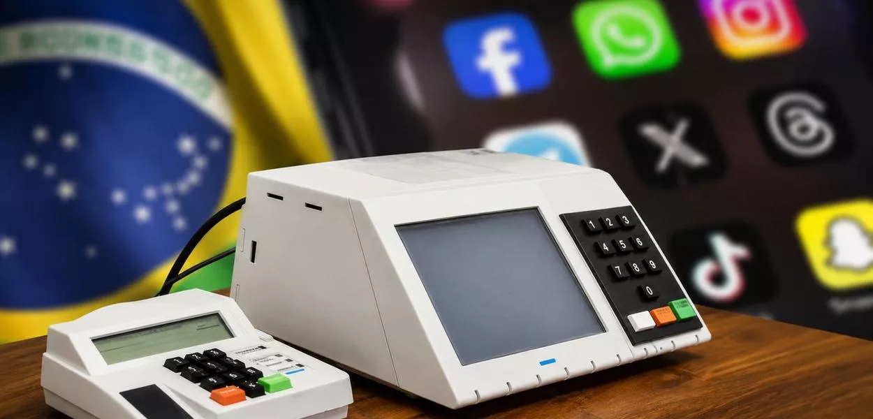 Urna eletrônica e celular com aplicativos que pertencem a Big Techs